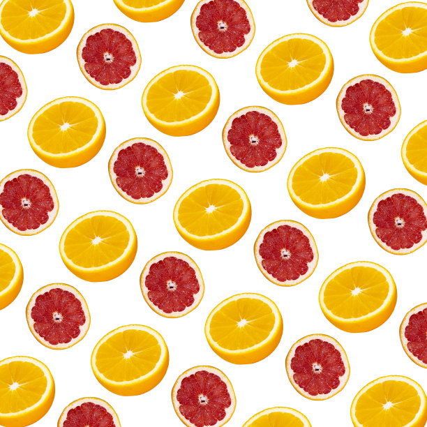 新鲜的橙和葡萄柚切片无缝的模式在粉红色的背景，俯视图图片下载