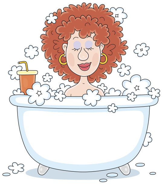 微笑的女人在洗泡泡浴图片下载