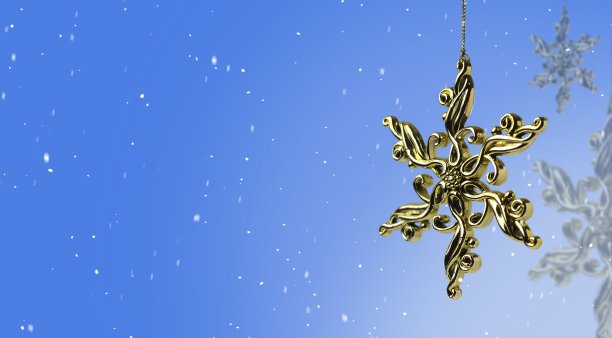 圣诞金色的玩具在蓝色的背景与雪。祝贺。卡。图片下载