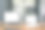 在现代办公室的木桌上模拟空白的白色屏幕笔记本电脑和平板电脑。图片下载