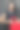时尚的照片，一个美丽优雅的年轻女子在一个漂亮的蓝色裙子拿着红色的手提包在灰色的背景图片下载