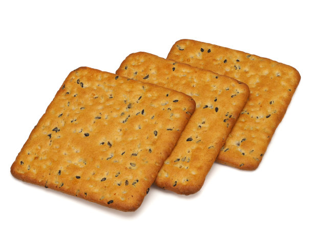 白色背景上的三块美味饼干（顶视图）图片下载