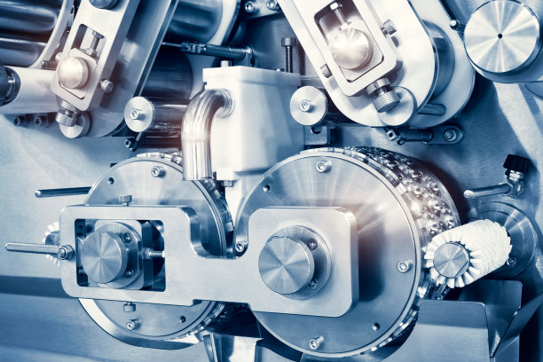 工业饼干和糖果制造机特写图片下载