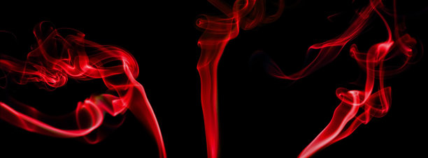 旋转运动的红烟群图片下载