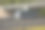 旅游车沿着桥下的公路交叉路口行驶图片下载
