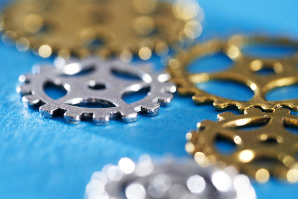 高角度轮组齿轮齿轮对蓝色背景图片下载