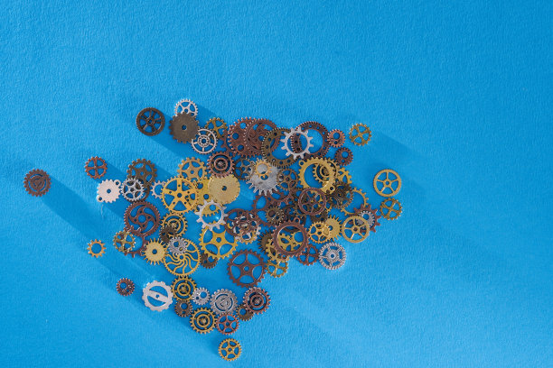 高角度轮组齿轮齿轮对蓝色背景图片下载