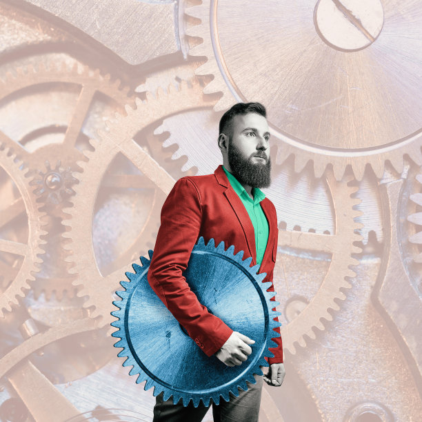 商人手里拿着一个齿轮。图片下载