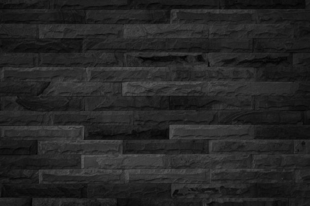 抽象暗砖墙面纹理背景图案，空砖墙面纹理。室内砖墙漆成黑色，旧的空白混凝土网格参差不齐，家居办公设计背景装饰。图片下载