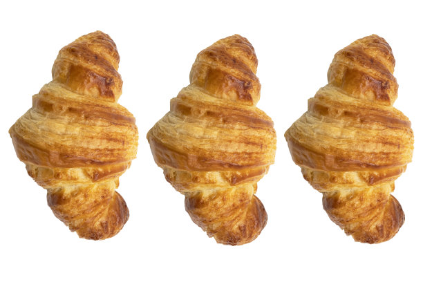 法国牛角包，新鲜出炉的牛角包，白色背景图片下载