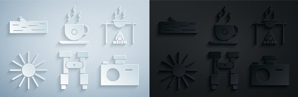 用双筒望远镜、篝火和盆栽太阳照相图片下载