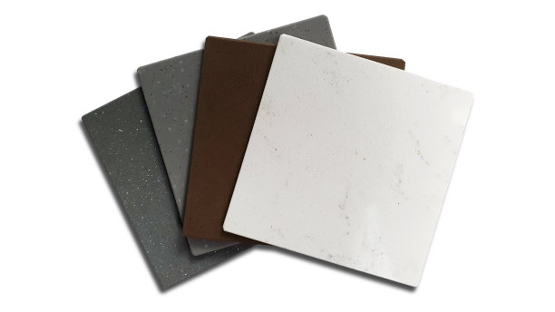 粒状人造石头样品样本由白色，棕色，灰色的颜色隔离在白色背景与剪切路径(集中在白色石头纹理)。装修材料，室内装修。图片下载