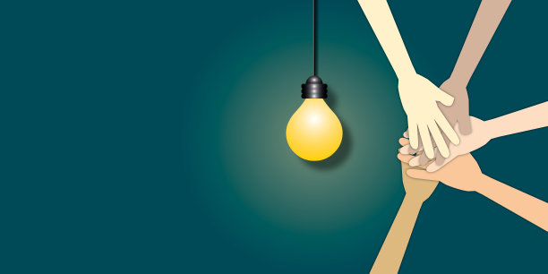 一群人叠手表示团结和团队精神。图片下载