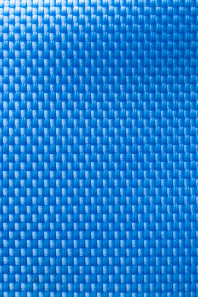 蓝色尼龙材质。深色聚酯纤维材料，用于运动布或抽象性织物背景。碳图案壁纸，平面设计。图片下载