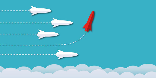 白色火箭中间的红色火箭在蓝色背景上改变方向，象征着商业创意新想法。图片下载
