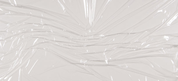 透明胶片背景玻璃纸。白色褶皱拉伸塑料纹理背景图片下载