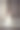 年轻脆弱的黑发女孩。新娘穿着奢华的婚纱在别致的室内与美丽的阳光从窗户婚礼发型和化妆。婚礼盐，美容院照片图片下载