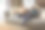 两个白人男孩坐在家里的沙发上用笔记本电脑和电子平板电脑图片下载