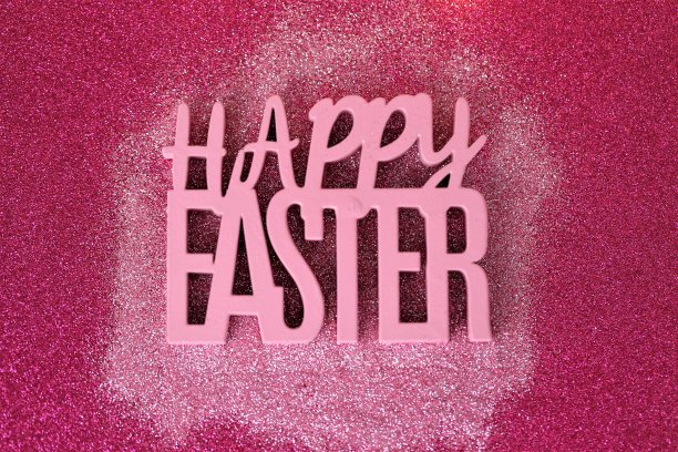 复活节快乐。粉红色背景上闪光的复活节快乐。宗教节日背景。复活节假期图片下载