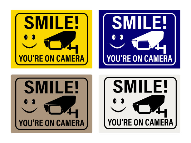 对着镜头微笑。视频监控信号。你在摄像机招牌和贴纸上。图片下载