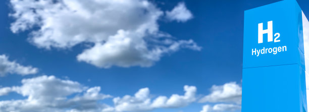 加油站燃油分配器上的氢标志。氢内燃机，零排放，环保运输图片下载