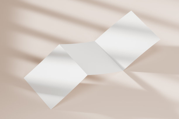 空白折叠纸或小册子上的米色背景与阴影与弯曲的边缘。模拟。3 d渲染。图片下载