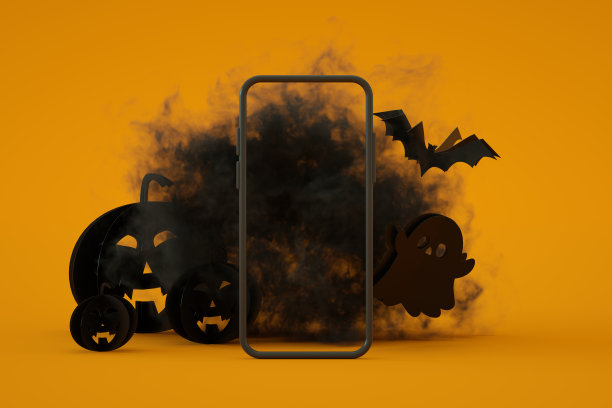 移动智能手机屏幕与万圣节橘色背景图片下载