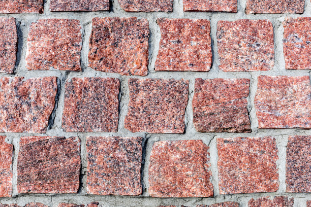 排成一行的方形铺路石。图片下载