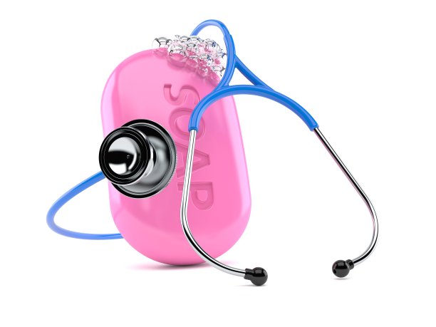一块带听诊器的肥皂图片下载