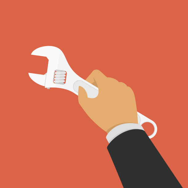 手拿活动扳手。图片下载