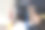 后视图亚洲女学生毕业带着毕业帽手持卷证书。毕业典礼概念照片图片下载