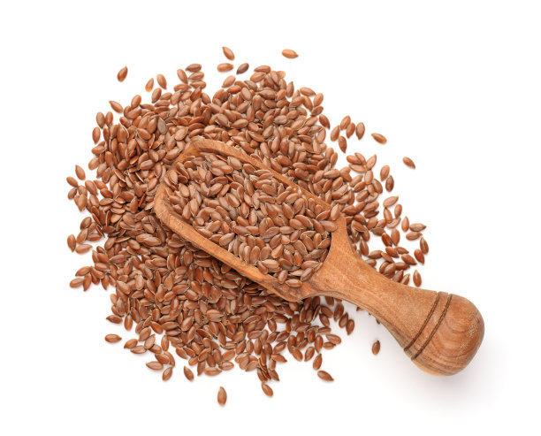 俯视图的亚麻种子在木勺图片下载