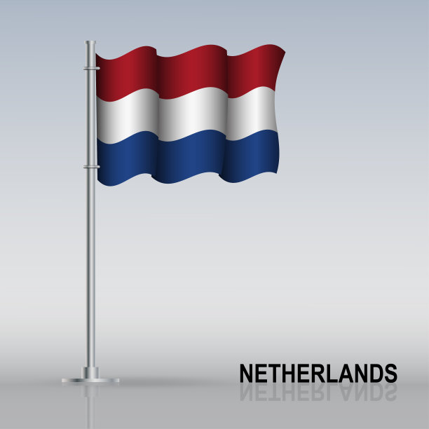 桌上立着旗杆上飘扬的荷兰国旗图片下载