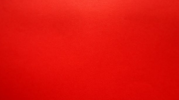 红色简单的圣诞背景。鲜亮生动的红色。图片下载