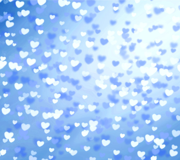蓝色和白色散景心的节日背景图片下载