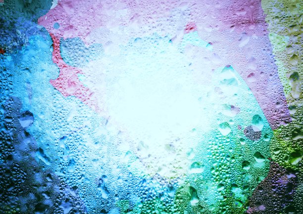 被彩色液体浸湿的窗玻璃的抽象背景图片下载