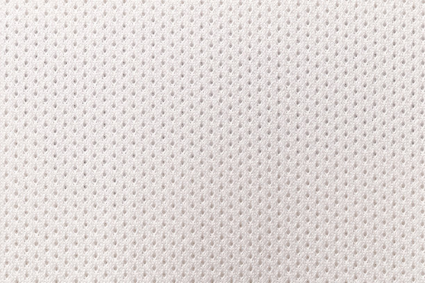 白色运动服装面料足球衬衫针织质地和织物背景。图片下载