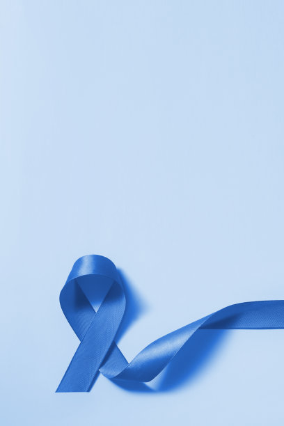 蓝丝带象征世界糖尿病日14月14日垂直格式图片下载