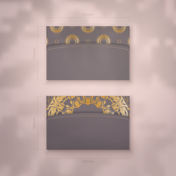 精美的棕色商务名片，上面装饰着奢华的黄金饰品。图片下载