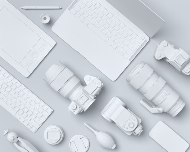 单色设计师工作空间和黑色桌子上的摄影设备的俯视图图片下载