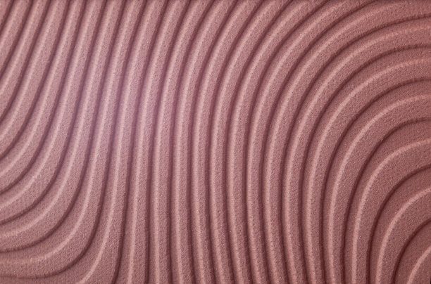 粉妆或眼影填充纹理，宏观，抽象的背景。波浪模式。粉色柔和的波浪。纹理的石膏。图片下载
