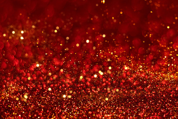 红色和金色闪光的散景背景图片下载