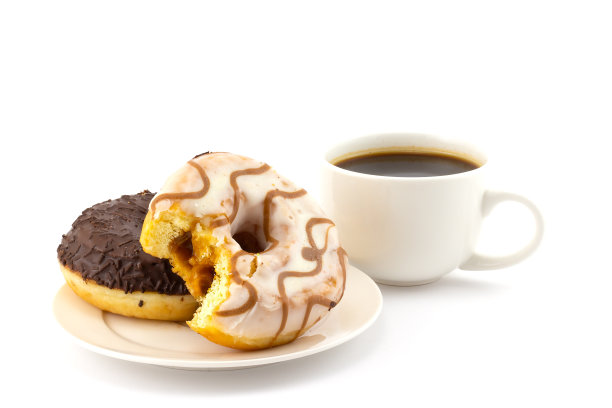 甜甜甜圈和咖啡杯。世界肥胖和不健康营养问题的概念背景图片下载