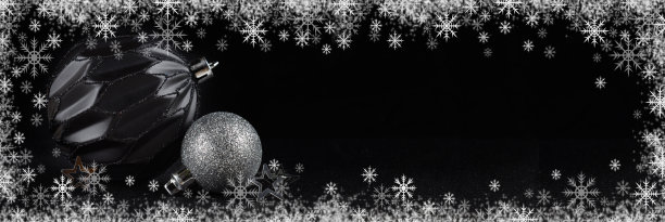 圣诞球在黑色背景与雪花框图片下载
