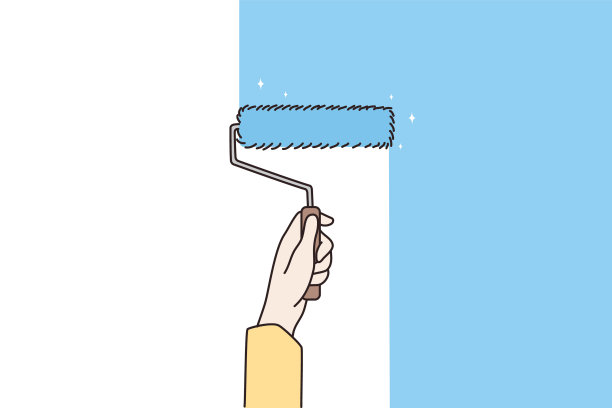 用滚筒刷油漆房子墙壁的人图片下载