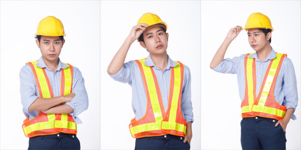 一套三半身二十多岁的亚洲男子黑头发，身穿安全服，头戴黄色安全帽。图片下载