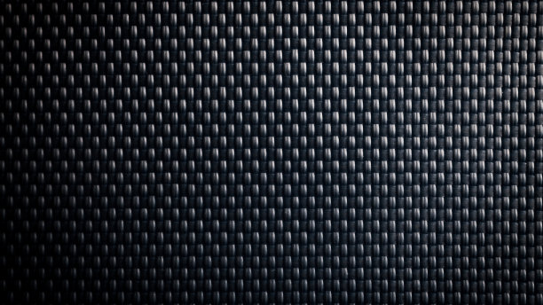 网状黑色纹理。深色聚酯纤维材料，用于运动布或抽象性织物背景。合成图案的背包和运动器材。图片下载