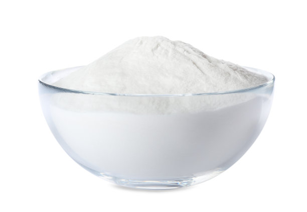 小苏打在玻璃碗上分离成白色图片下载