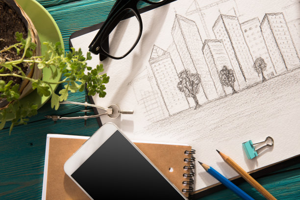 桌子上的建筑草图图片下载