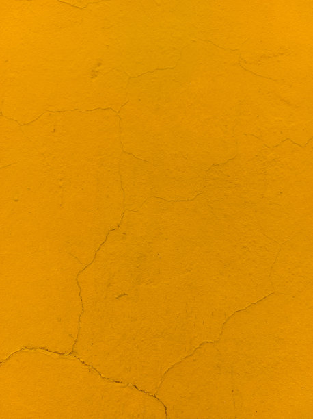 墙面漆成黄色，表面有裂缝图片下载